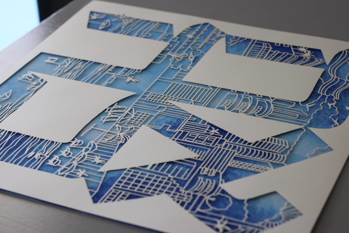 Paper cut layers on the studio desk