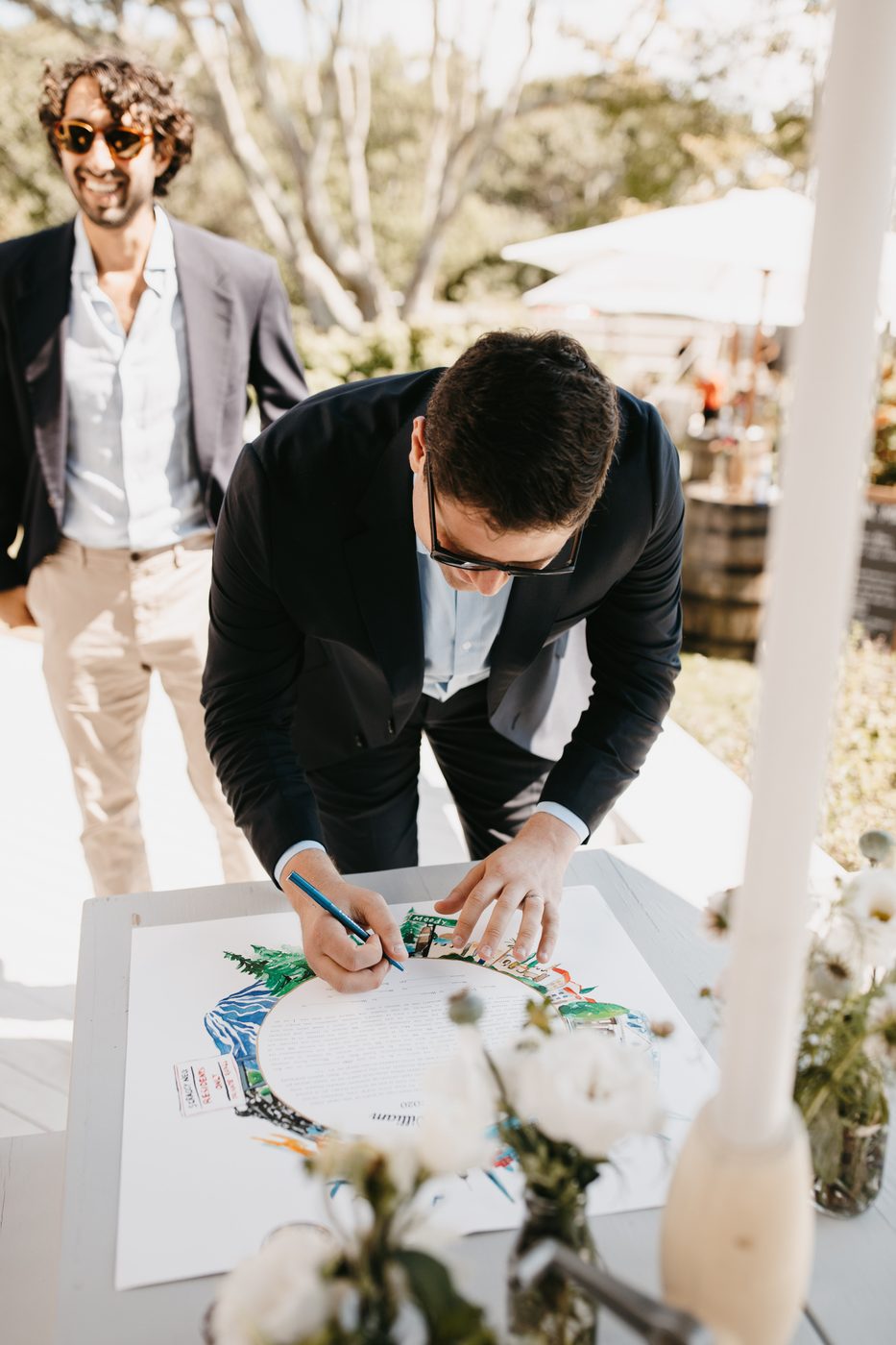 Laura & William — groom signing