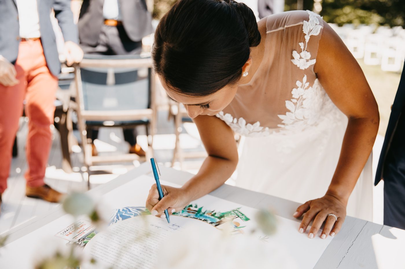 Laura & William — bride signing